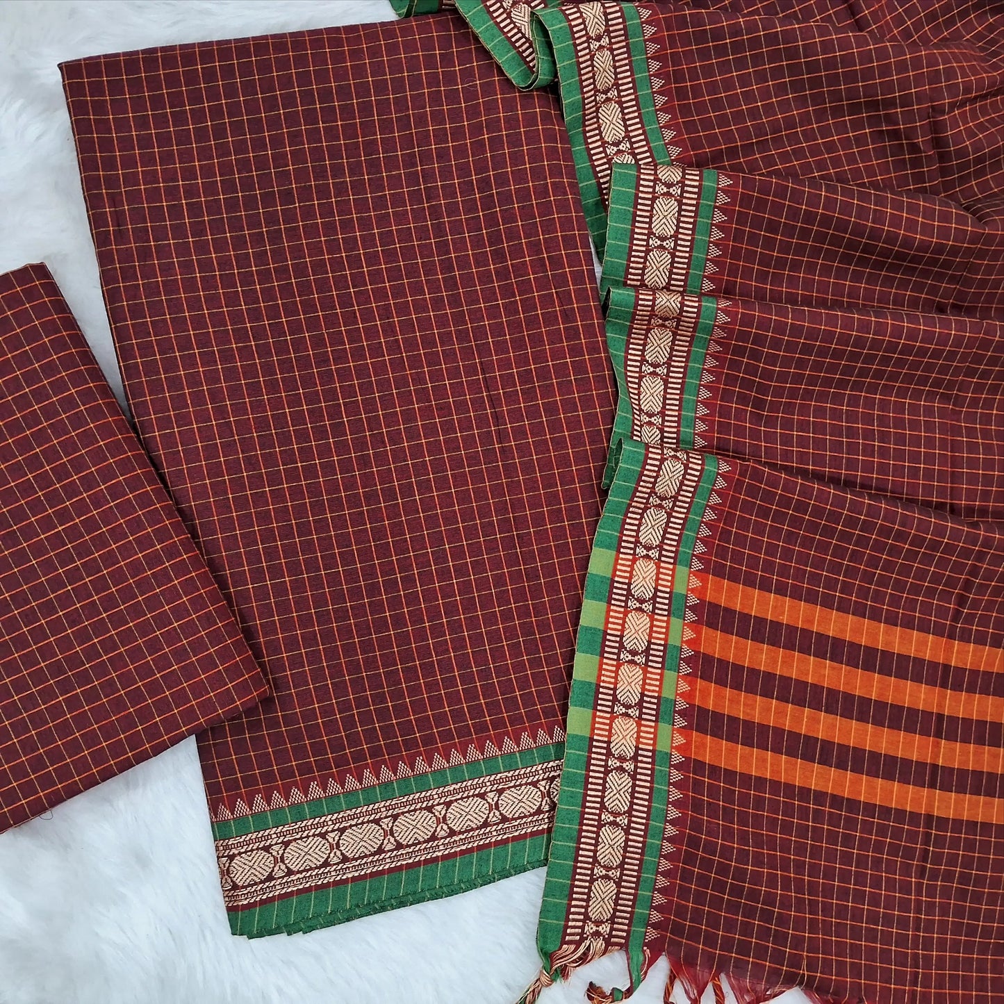 Maroon mercerised handloom cotton unstitched salwar material, checked all over, double side borders (textured,Lining Needed) checked handloom bottom, checked full length mercerized handloom cotton dupatta. MR262127