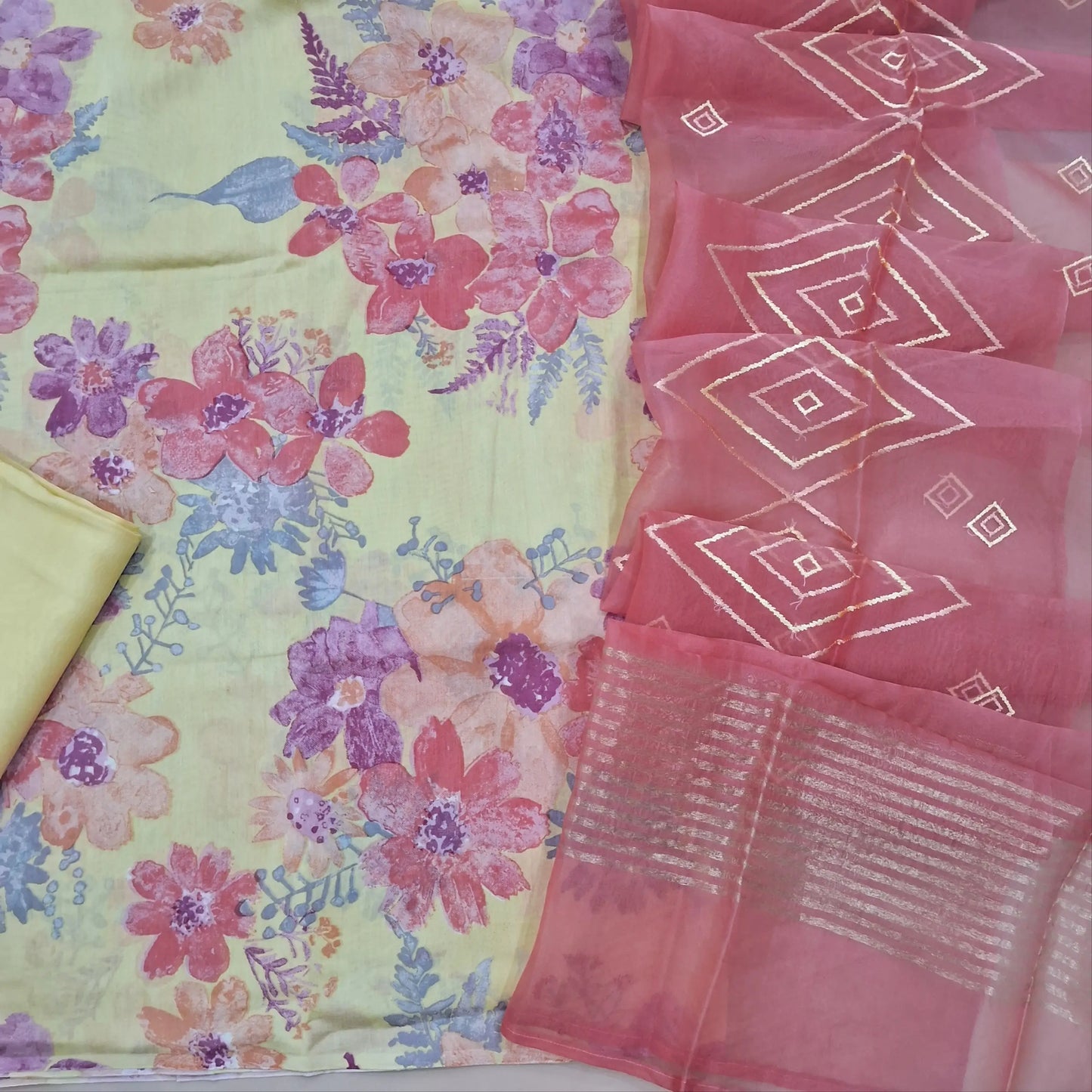 Designer pastel yellow mul chanderi unstitched salwar material, digital printed (Soft, Lining Needed) Matching silky bottom, peachish pink premium organza silk dupatta with heavy embroidery. SP260417