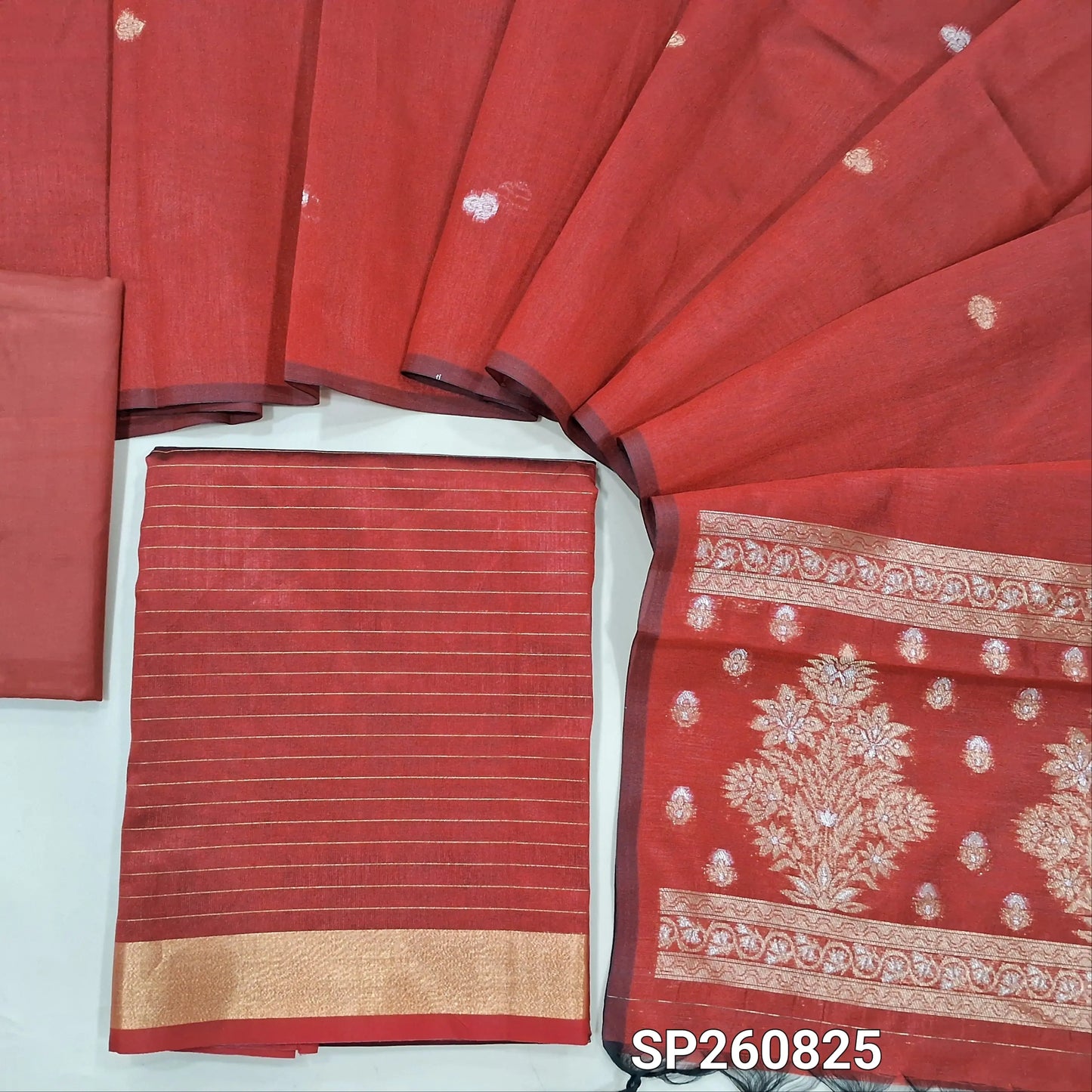 Rust Orange silk cotton unstitched salwar material,zari lines all over,(Lining Needed)silky bottom, benarsi zari woven on full length silk cotton dupatta with rich gold and silver zari pallu. SP260825