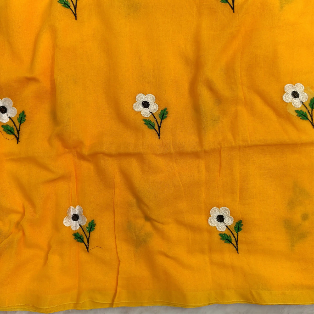 Bright sunshine yellow mul mul cotton saree(soft, light weight)with embroidery all over, handmade tassles in pallu, running blouse. NS280