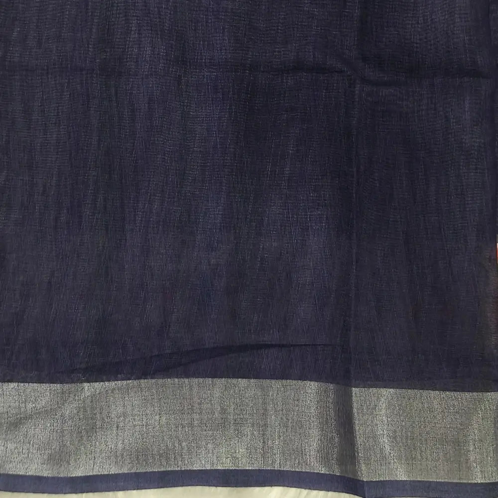 Dark Blue semi linen saree(thin& light weight)warli print& silver tissue on borders, warli printed pallu with tassels, plain running blouse with silver tissue borders. NS33