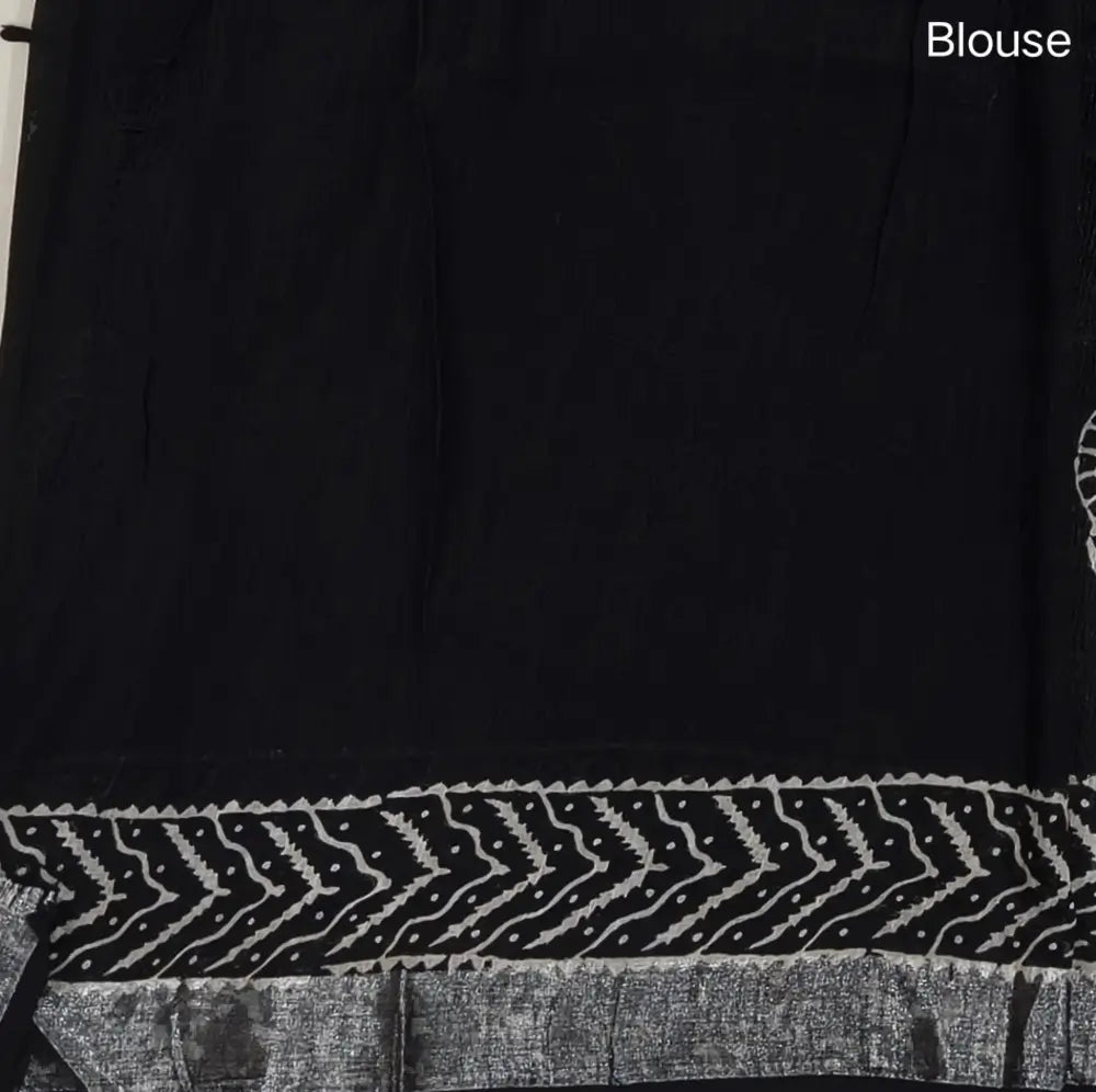 Black block printed linen cotton saree with double side silver zari borders (lightweight,soft) printed pallu with silver zari stripes, plain running blouse with borders. NS61