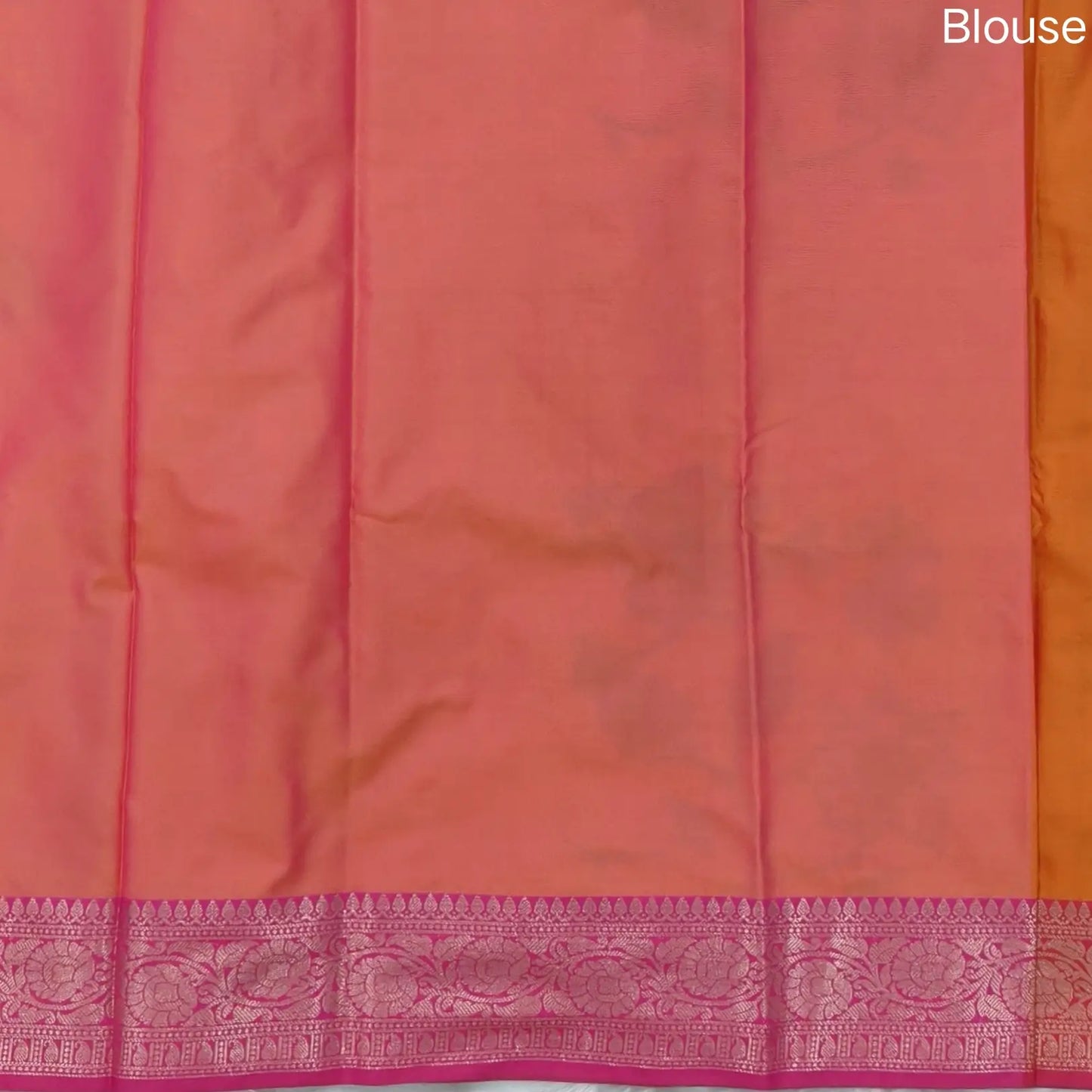 Orange dual shaded ikat printed soft silk saree with silver zari woven double side borders, contrast printed pallu, contrast running blouse with zari woven borders. NS97