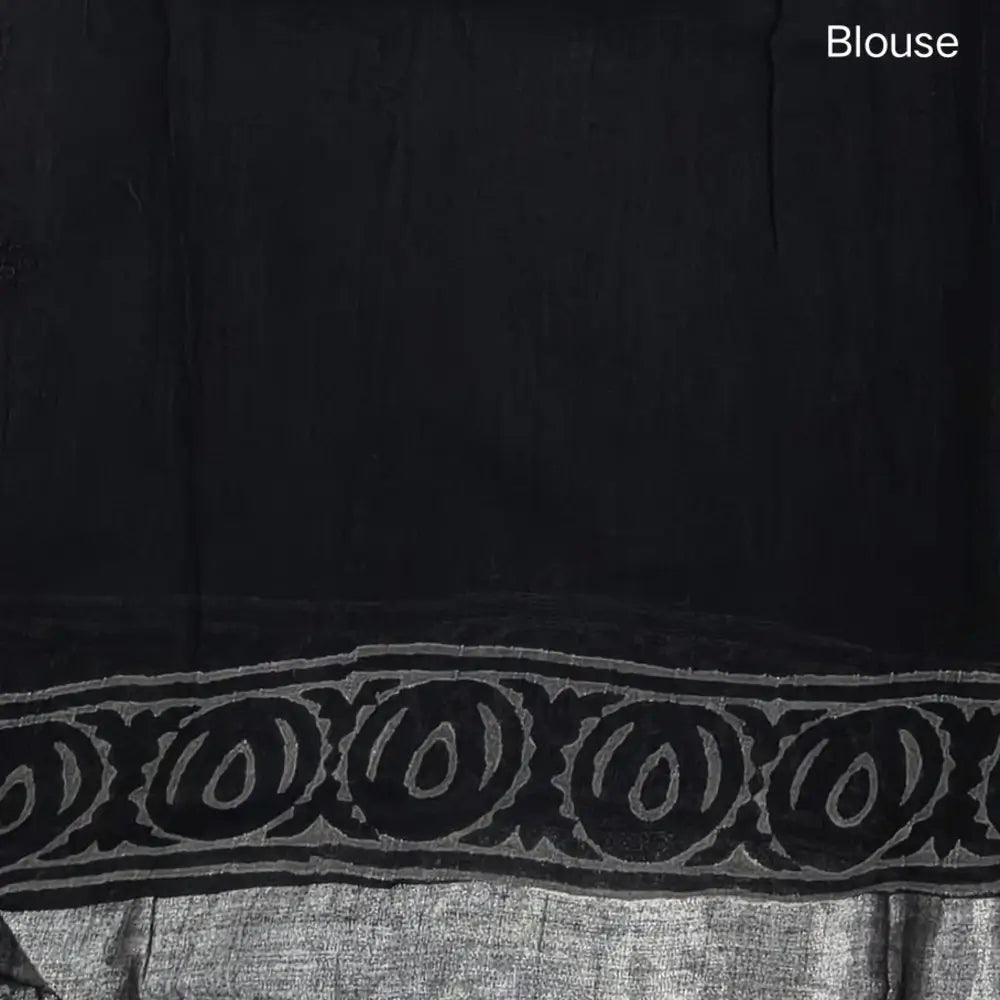 Black block printed linen cotton saree with double side silver zari borders (lightweight,soft) printed pallu with silver zari stripes, plain running blouse with borders. NS111