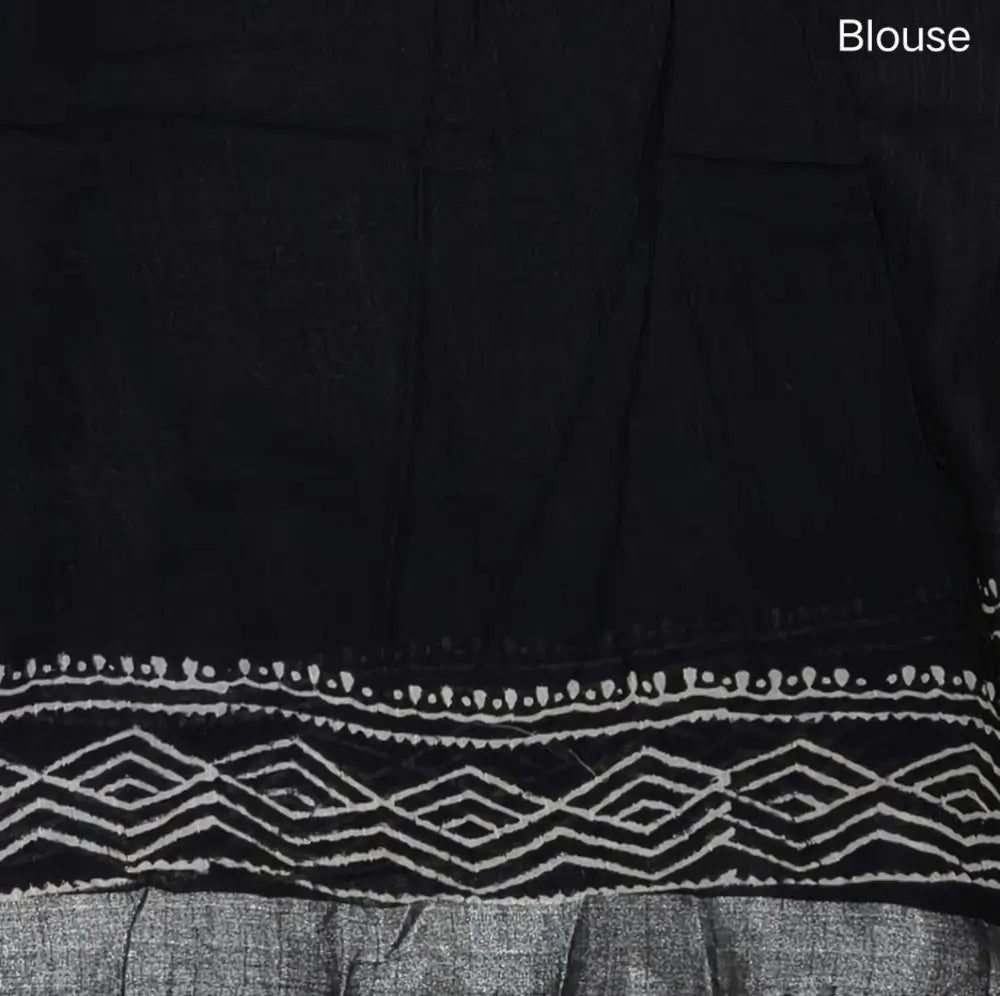 Black block printed linen cotton saree with double side silver zari borders (lightweight,soft) printed pallu with silver zari stripes, plain running blouse with borders. NS108