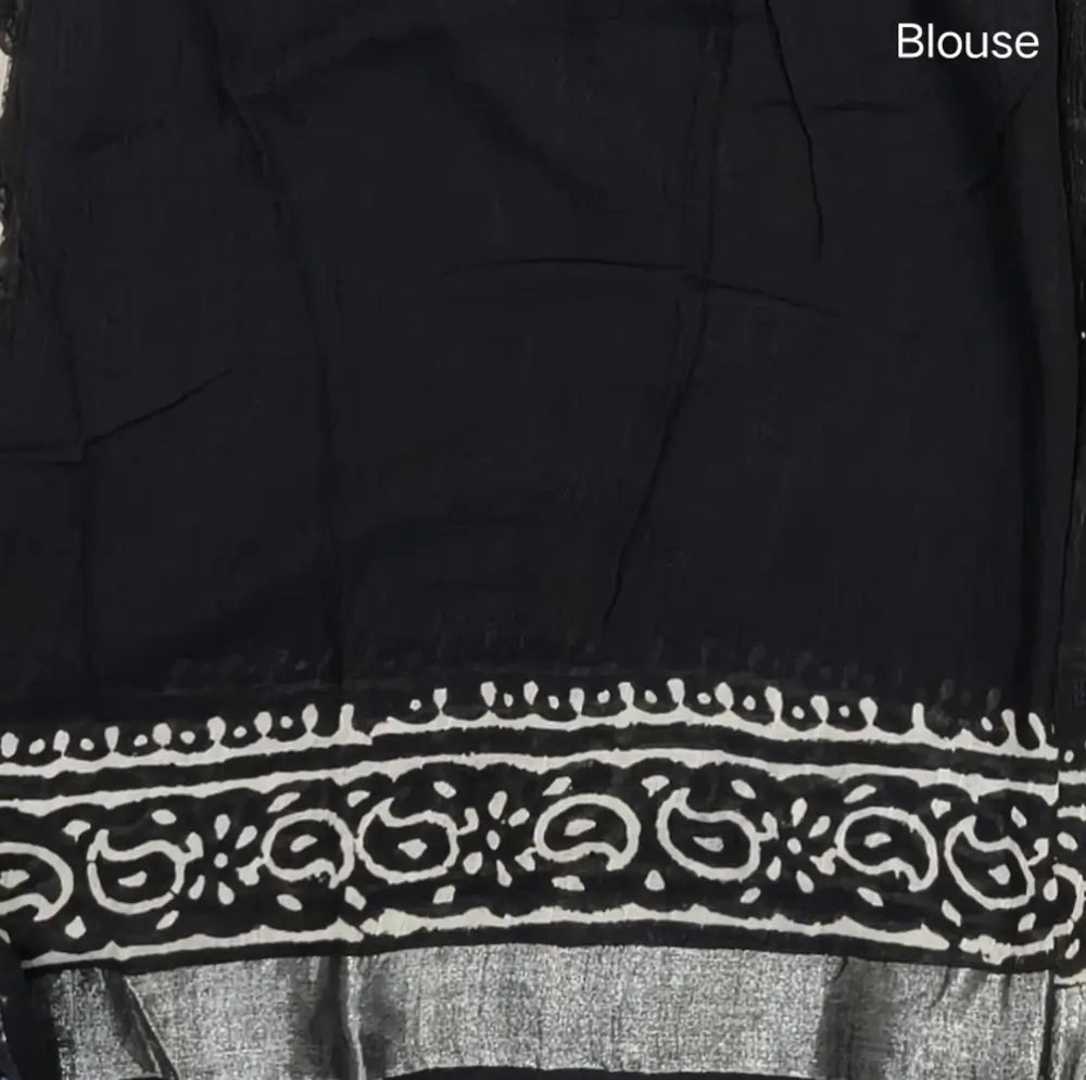Black block printed linen cotton saree with double side silver zari borders (lightweight,soft) printed pallu with silver zari stripes, plain running blouse with borders. NS110