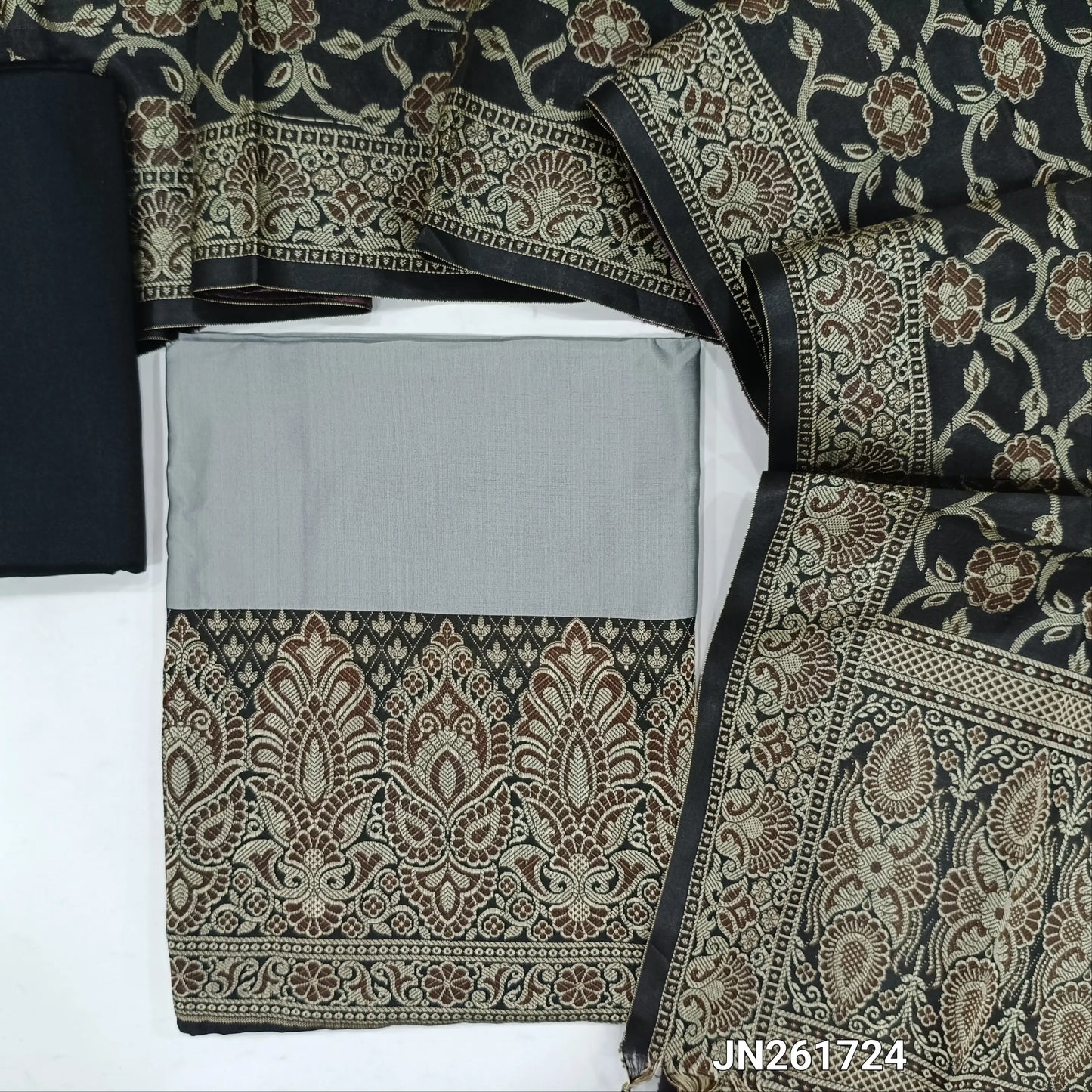 Silver grey premium silk cotton unstitched salwar material, brocade weaving on daman,(Lining needed)black silk cotton bottom, brocade weaving on silk cotton full length dupatta with rich pallu and tassles. JN261724