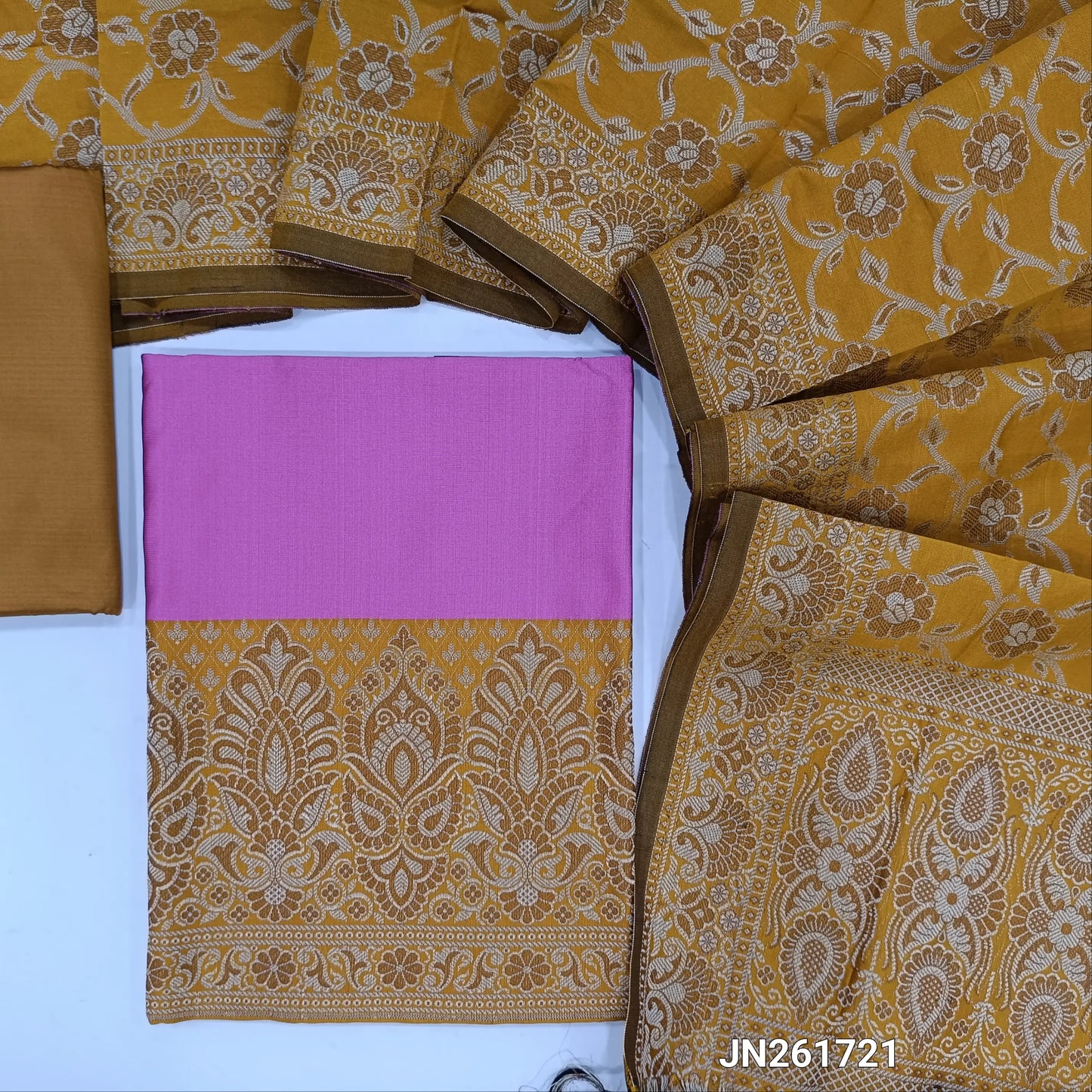 Pink premium silk cotton unstitched salwar material, brocade weaving on daman,(Lining needed)mehandhi yellow silk cotton bottom, brocade weaving on silk cotton full length dupatta with rich pallu and tassles.JN261721