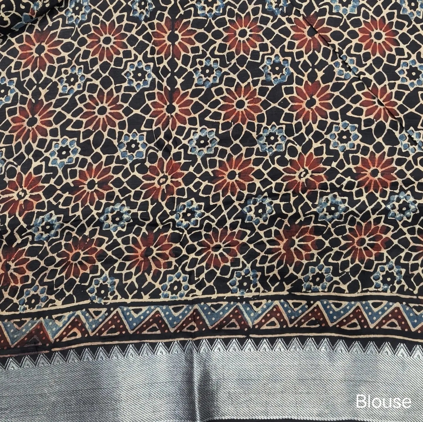 Black ajrak hand block printed pure dola silk saree, benarasi zari woven double side borders, hand block printed pallu, running blouse with borders.(DRY CLEAN RECOMMENDED , MILD STAINS AND DYES ARE NOT DEFECTS). NS102