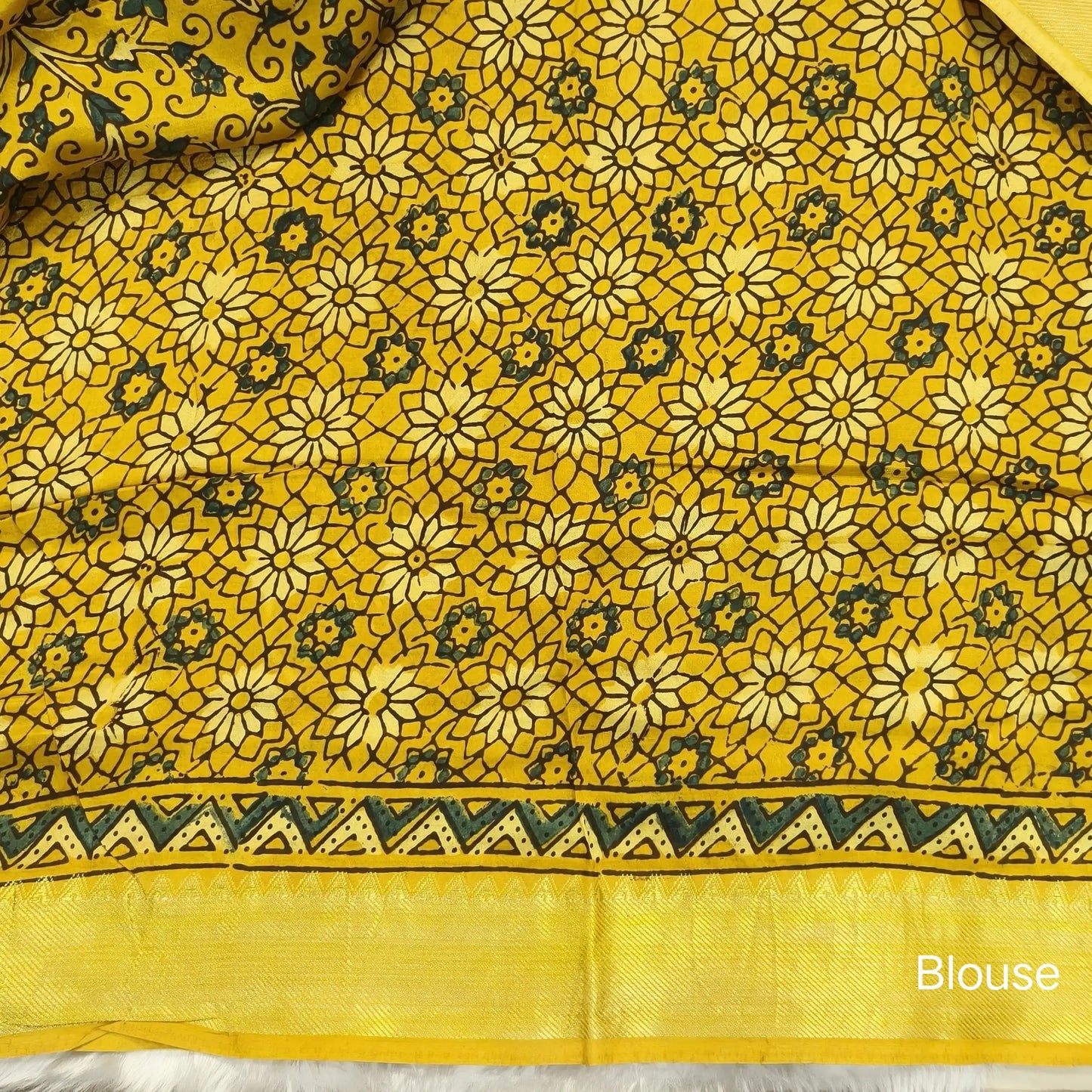 Mehandhi yellow ajrak hand block printed pure dola silk saree, benarasi zari woven double side borders, hand block printed pallu, running blouse with borders.(DRY CLEAN RECOMMENDED , MILD STAINS AND DYES ARE NOT DEFECTS). NS99