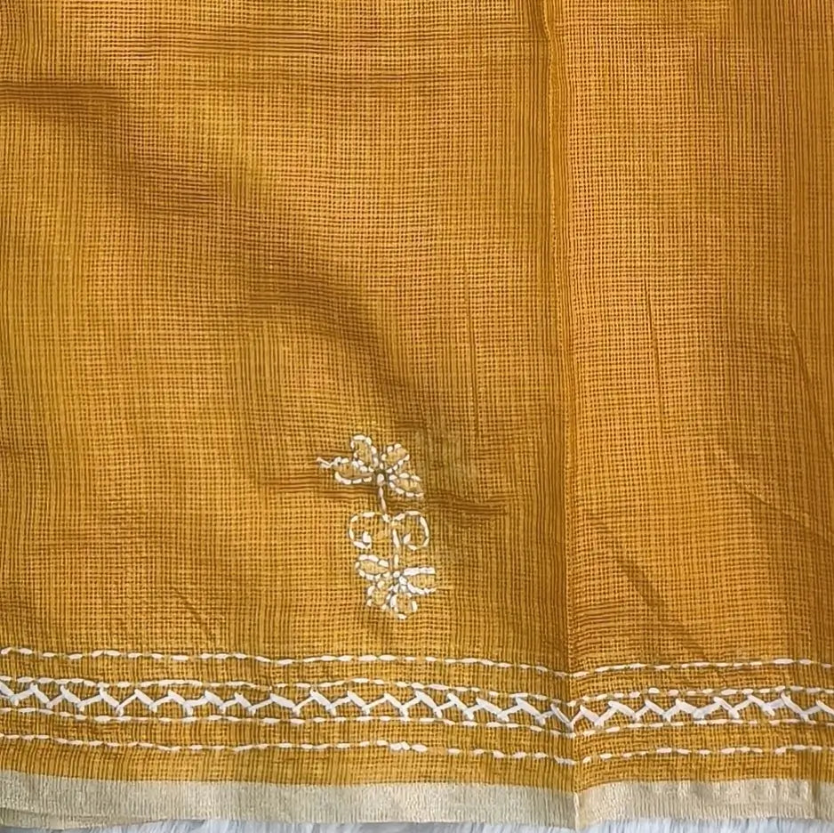 Yellow premium kota silk saree(soft, thin)with rich hand embroidery work all over,thin tissue borders,rich embroidered pallu,running blouse with embroidery and borders. NS290