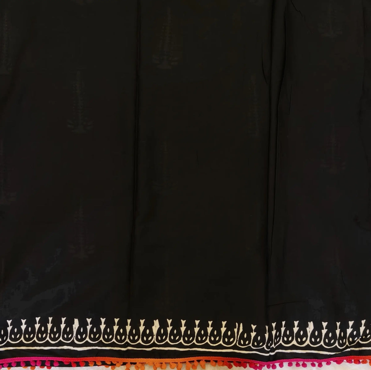 Black soft cotton printed saree with pom pom tapings (Thin, Soft)printed pallu, plain running blouse with borders. NS295