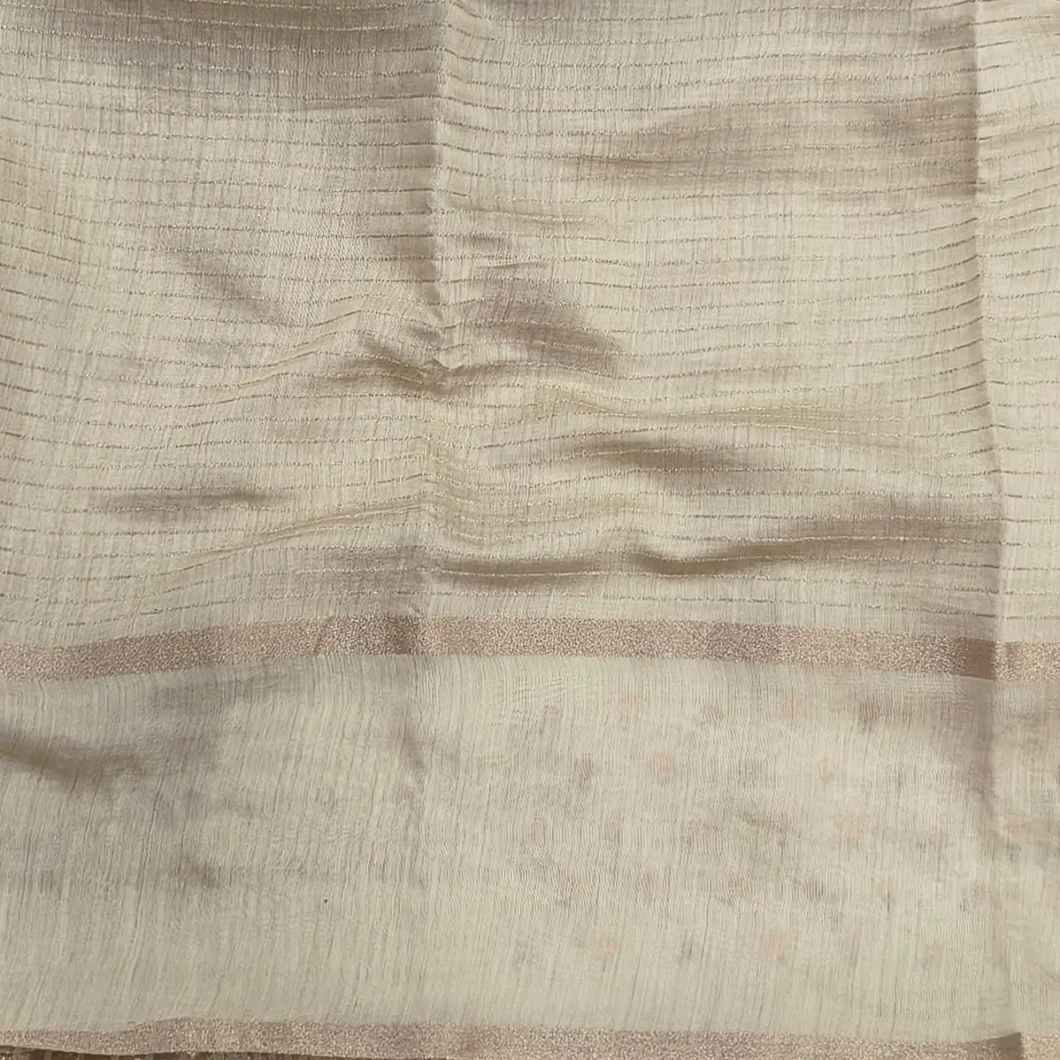 Designer off white assam silk saree with zari stripes all over (Soft, Thin) embroidered gap borders, zari stripes on pallu, running bluose with zari stripes and borders. NS304