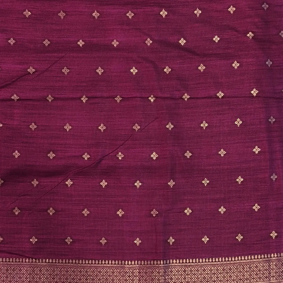Dark beetroot purple premium ribbed silk saree(textured,thin)with silver and antique gold zari,weaving all over,antique gold zari woven pallu,running blouse with zari woven buttas and borders. NS249