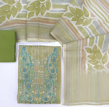 Pastel green with silver tint sobar printed tissue silk cotton unstitched salwar material, embroidered on yoke(thin fabric, lining needed)matching spun cotton bottom, digital printed tissue silk cotton dupatta. CODE NV240115