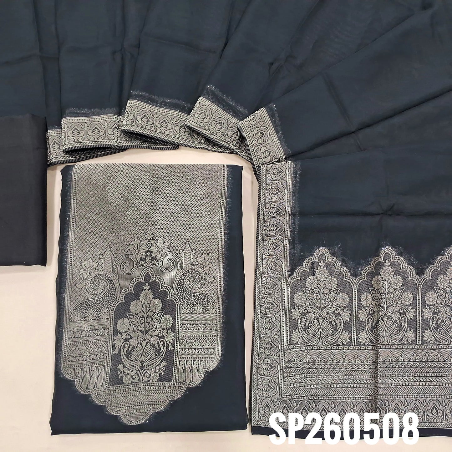 PREORDER SHIPPING IN 45 DAYS Black pure kora silk unstitched salwar material, rich gold zari weaving on yoke and daman (Thin, Lightweight, Lining Needed) Matching santoon bottom, kora silk dupatta with rich zari weaving on pallu. SP260509
