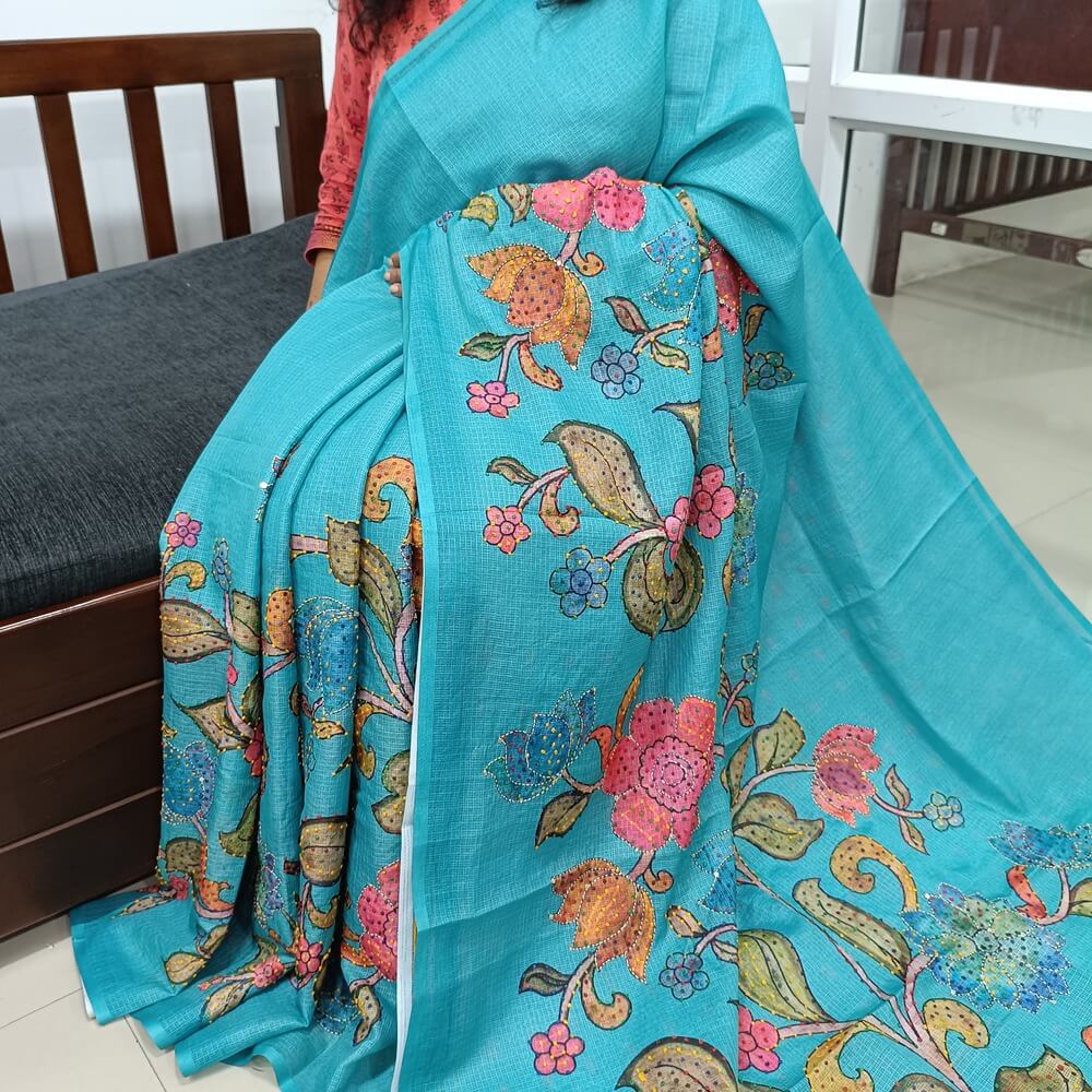 Turquoise Blue Premium kota silk saree (lightweight, thin, soft) colorful floral prints highlighted with hand embroidery work, rich pallu. Digital printed kota silk blouse. NS53