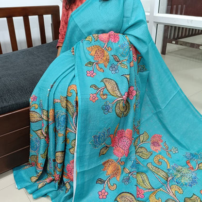 Turquoise Blue Premium kota silk saree (lightweight, thin, soft) colorful floral prints highlighted with hand embroidery work, rich pallu. Digital printed kota silk blouse. NS53