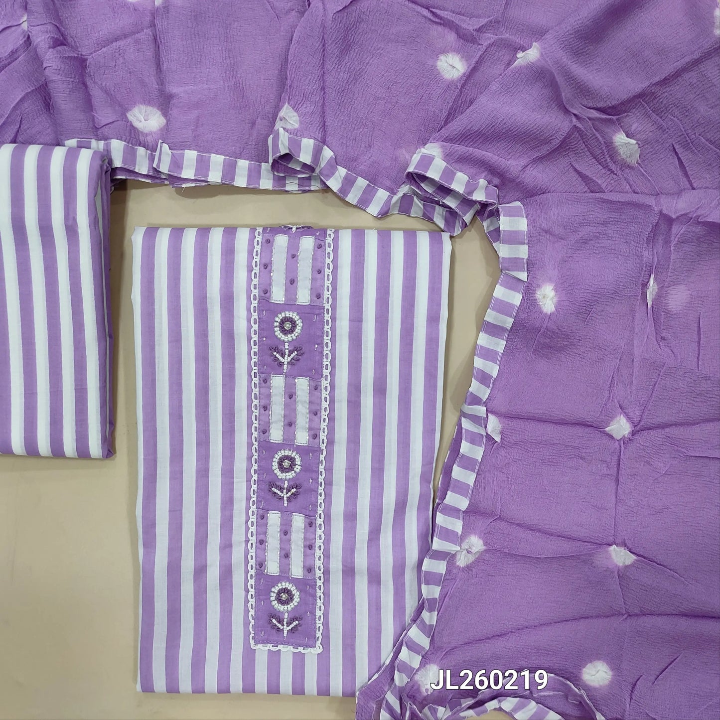 Designer purple vertical printed pure soft cotton unstitched salwar material, bead & french kont work on yoke (thin,lining optional)vertical printed cotton bottom,dye and dyed pure chiffon dupatta with printed tapping.JL260219