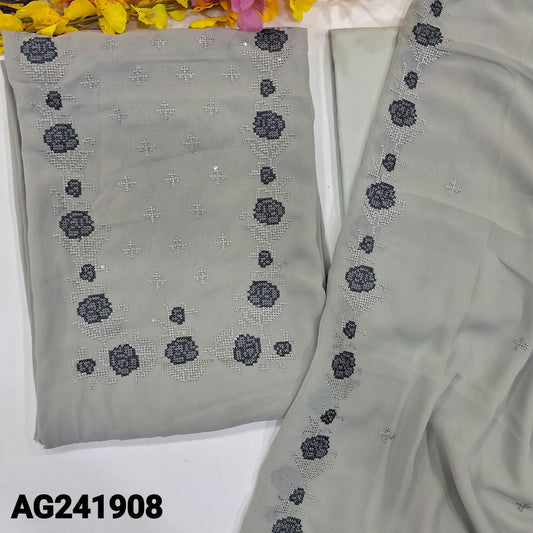 CODE AG241908 : Light grey semi georgette unstitched salwar material, cross stitch embroidered& sequins work on yoke(thin fabric, lining needed)matching silky bottom, cross stitch embroidered semi georgette dupatta.