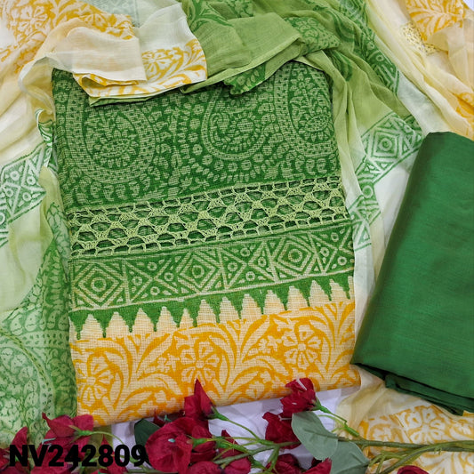 CODE NV242809 : Green& yellow block printed fancy super net unstitched salwar material, crochet lace work on yoke(netted fabric, lining needed)matching silk cotton bottom, dual shaded block printed chiffon dupatta with crochet lace work.