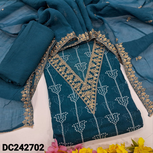 CODE DC242702 : Dark teal blue bandhini printed pure organza unstitched salwar material, v neck with zari& sequins work(thin fabric, lining needed)matching santoon bottom, pure organza short width dupatta with zari &sequins work.