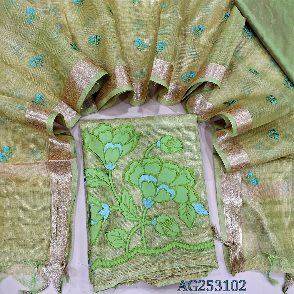 Pastel green designer tissue silk cotton unstitched salwar material, thin zari lines all over, applique work on daman(thin, lining needed)matching silk cotton bottom, embroidered tissue silk cotton dupatta with zari woven borders. CODE AG253102