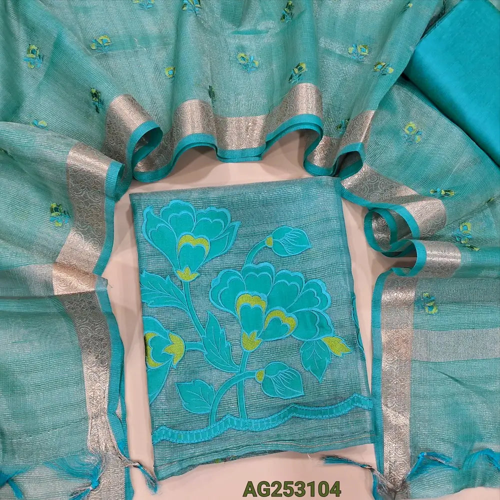 Pastel blue designer tissue silk cotton unstitched salwar material, thin zari lines all over, applique work on daman(thin, lining needed)matching silk cotton bottom, embroidered tissue silk cotton dupatta with zari woven borders. CODE AG253104