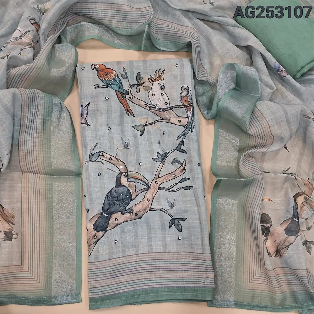Pale green digital printed semi linen unstitched salwar material, bead& faux mirror work on front(thin, lining needed)matching santoon bottom, digital printed semi linen dupatta with silver tissue borders. CODE AG253107
