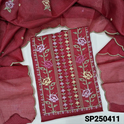 Dark maroon fancy kota silk cotton unstitched salwar material, cross stitch embroidery on yoke(lining needed)matching silky fabric provided for both bottom& lining, embroidered fancy kota silk cotton dupatta with scallop edges. CODE SP250411