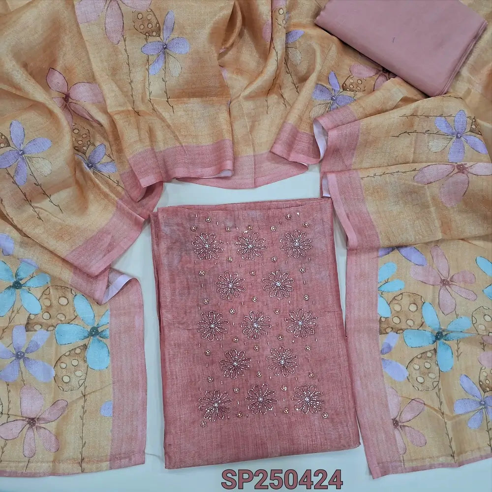 Pastel pink tissue silk cotton unstitched salwar material, rich bead work on yoke, floral printed daman(thin, lining needed)matching silky bottom, floral printed tissue silk cotton dupatta. CODE SP250424