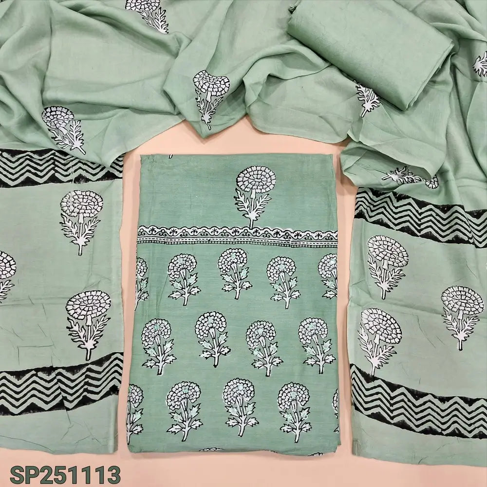 Light cement green hand block printed premium muslin silk unstitched salwar material, faux mirror work on yoke(lining needed)matching silky bottom, hand block printed premium muslin silk dupatta. CODE SP251113