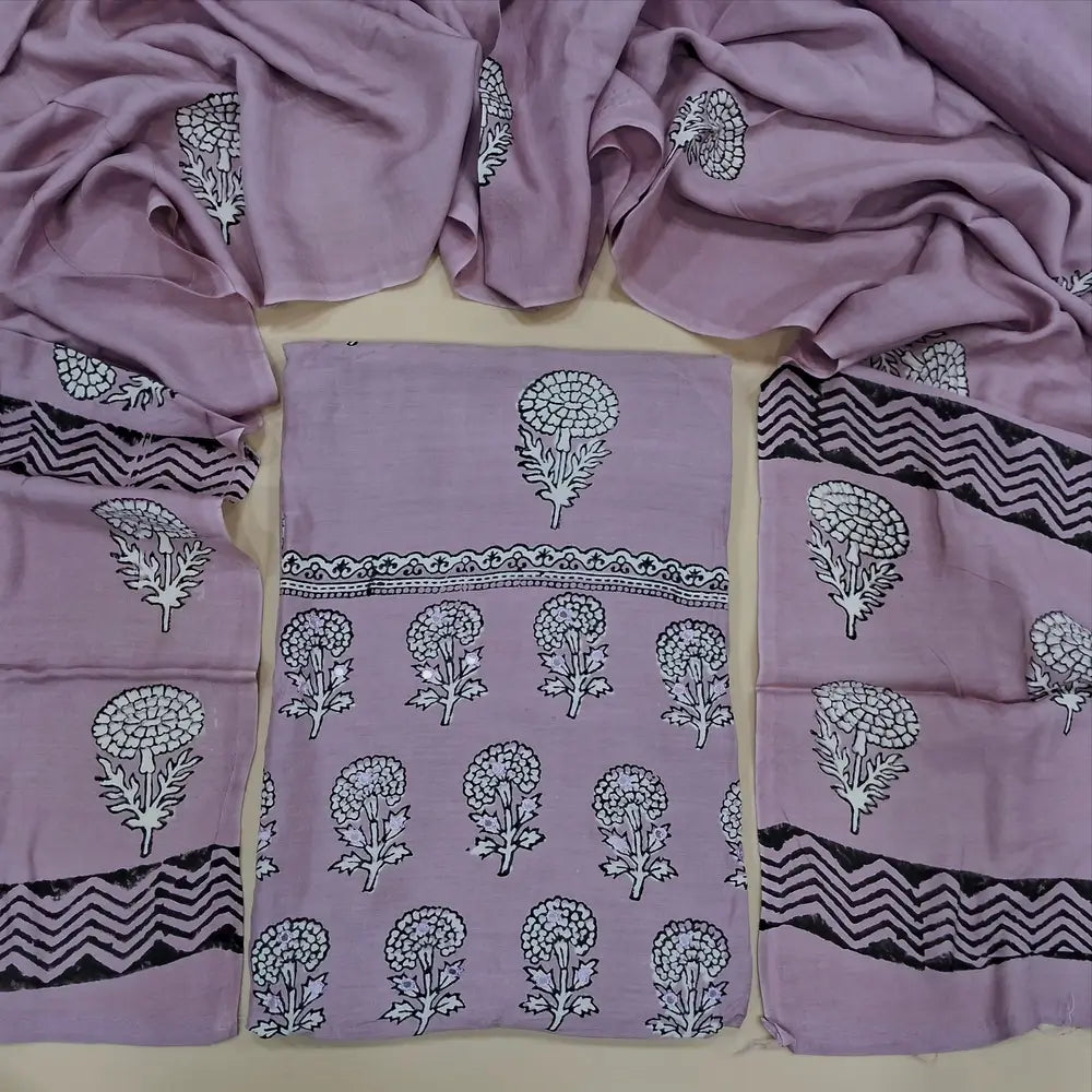 Lavender hand block printed premium muslin silk unstitched salwar material, faux mirror work on yoke(lining needed)matching silky bottom, hand block printed premium muslin silk dupatta. CODE SP251114