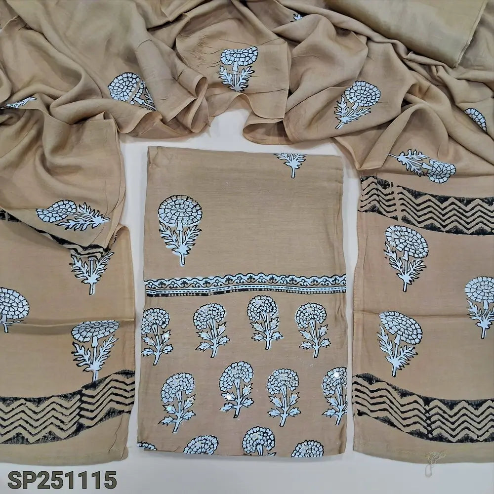 Dark beige hand block printed premium muslin silk unstitched salwar material, faux mirror work on yoke(lining needed)matching silky bottom, hand block printed premium muslin silk dupatta. CODE SP251115
