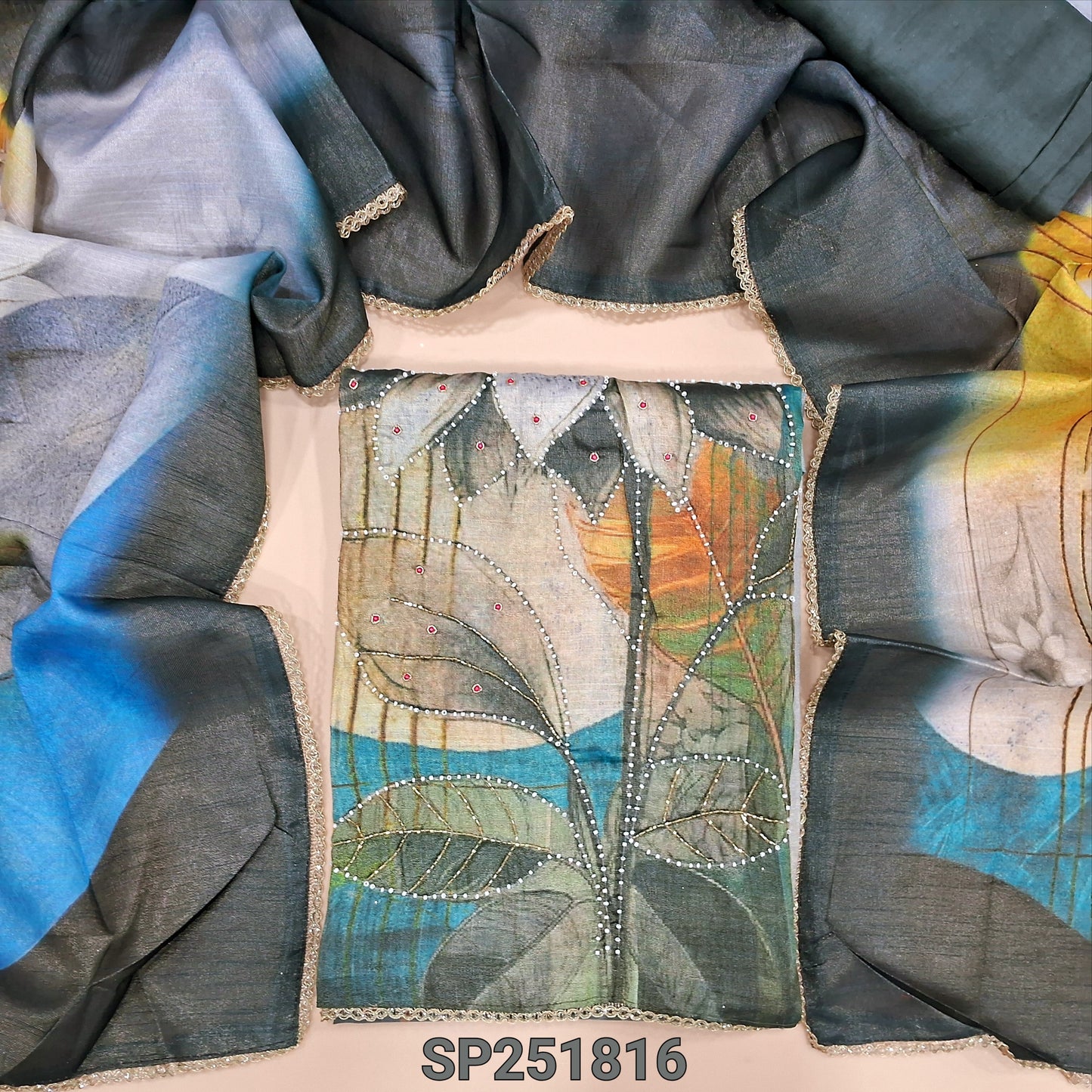 Multicolor with gold tint soft premium tissue silk cotton unctitched salwar material, printed highlighted with bead work (Textured, Lining Needed) Dark Grey santoon bottom, short width abstract printed tisse silk cotton dupatta. SP251816