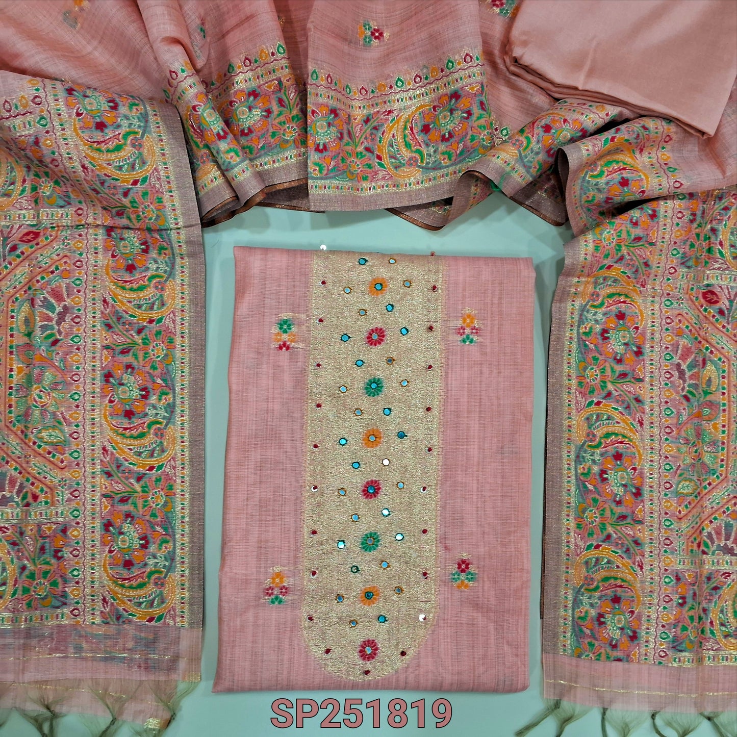 Peachish Pink jamdani woven premium soft silk cotton unstitched salwar material with meenkaari work on yoke and daman with faux mirror work (Thin, Lining Needed) matching santoon bottom, jamdani woven dupatta with meenakaari work on borders. SP251819