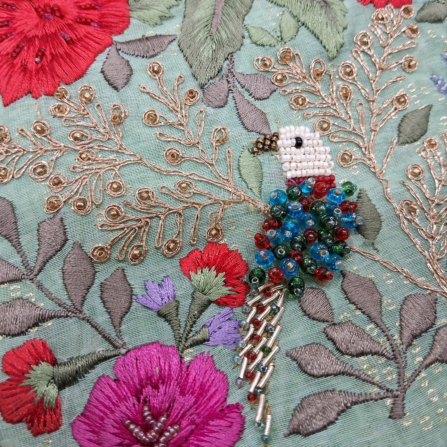 Sea green printed premium silk cotton unstitched salwar material,embroidery and handmade bead work on yoke(thin,lining needed) premium silky bottom,premium organza short width dupatta with embroidery and cutwork on borders. SP252111