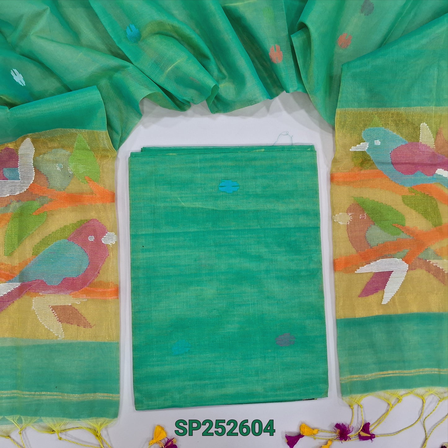 Dual Shaded Green muslin jamdani unstitched salwar material, hand woven design all over(thin, lining needed)NO BOTTOM,hand woven muslin jamdani full length dupatta with rich paithani weaving pallu& hand made tassels. SP252604