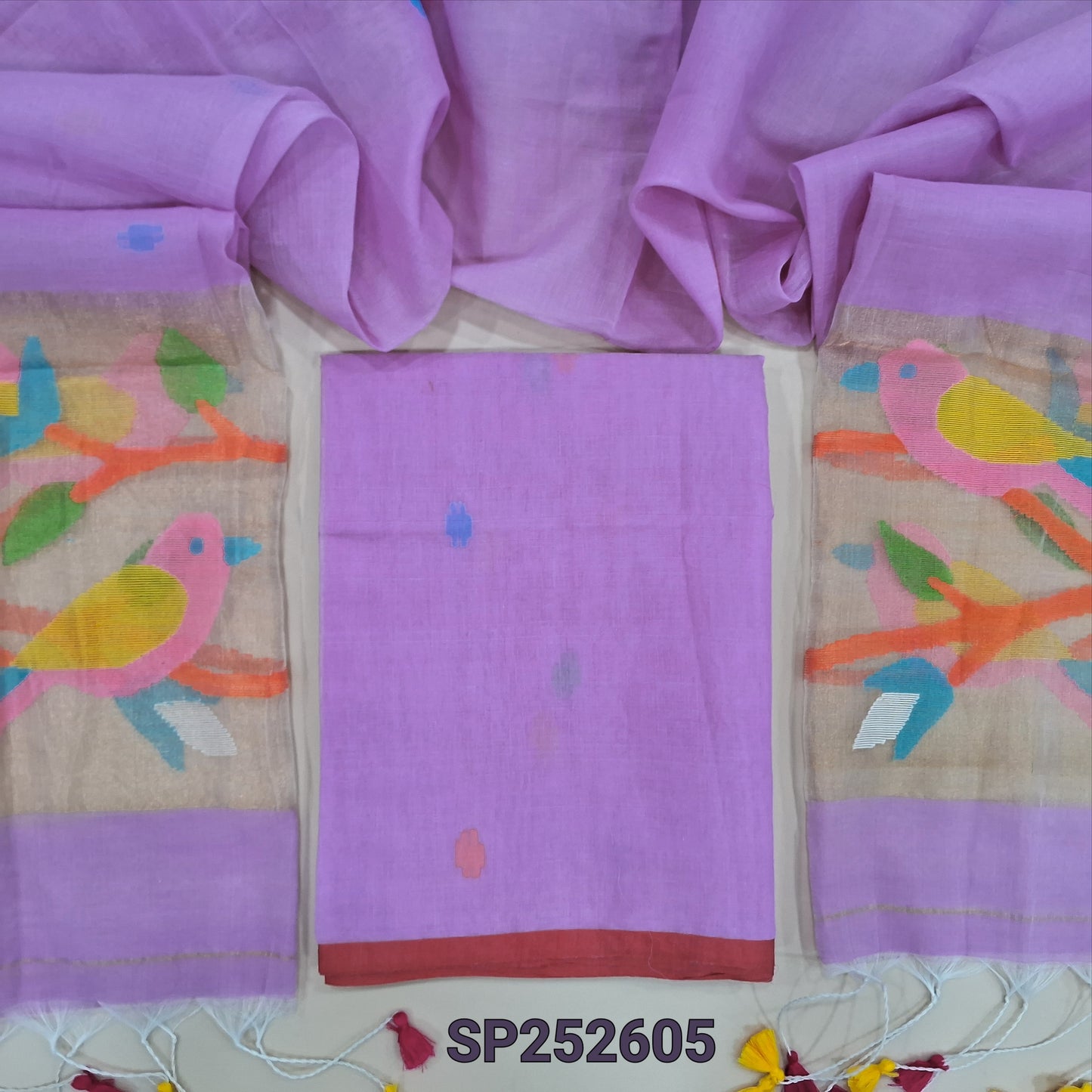 Light Purplish Pink muslin jamdani unstitched salwar material, hand woven design all over(thin, lining needed)NO BOTTOM,hand woven muslin jamdani full length dupatta with rich paithani weaving pallu& hand made tassels. SP252605