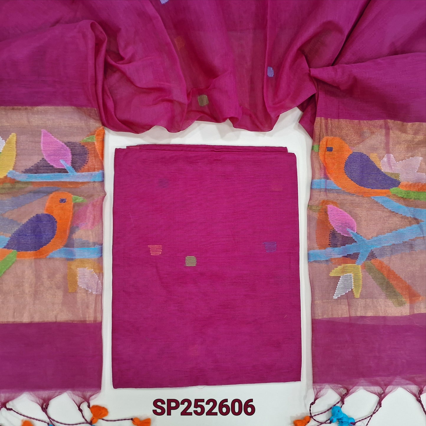 Dark Pink muslin jamdani unstitched salwar material, hand woven design all over(thin, lining needed)NO BOTTOM,hand woven muslin jamdani full length dupatta with rich paithani weaving pallu& hand made tassels. SP252606