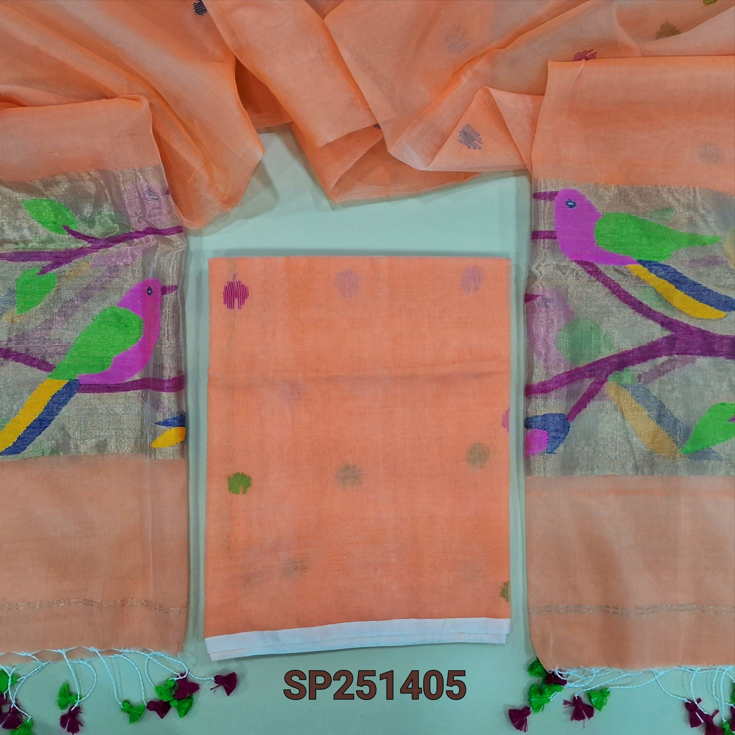 Pastel Peach muslin jamdani unstitched salwar material, hand woven design all over(thin, lining needed)NO BOTTOM,hand woven muslin jamdani full length dupatta with rich paithani weaving pallu& hand made tassels. SP251405