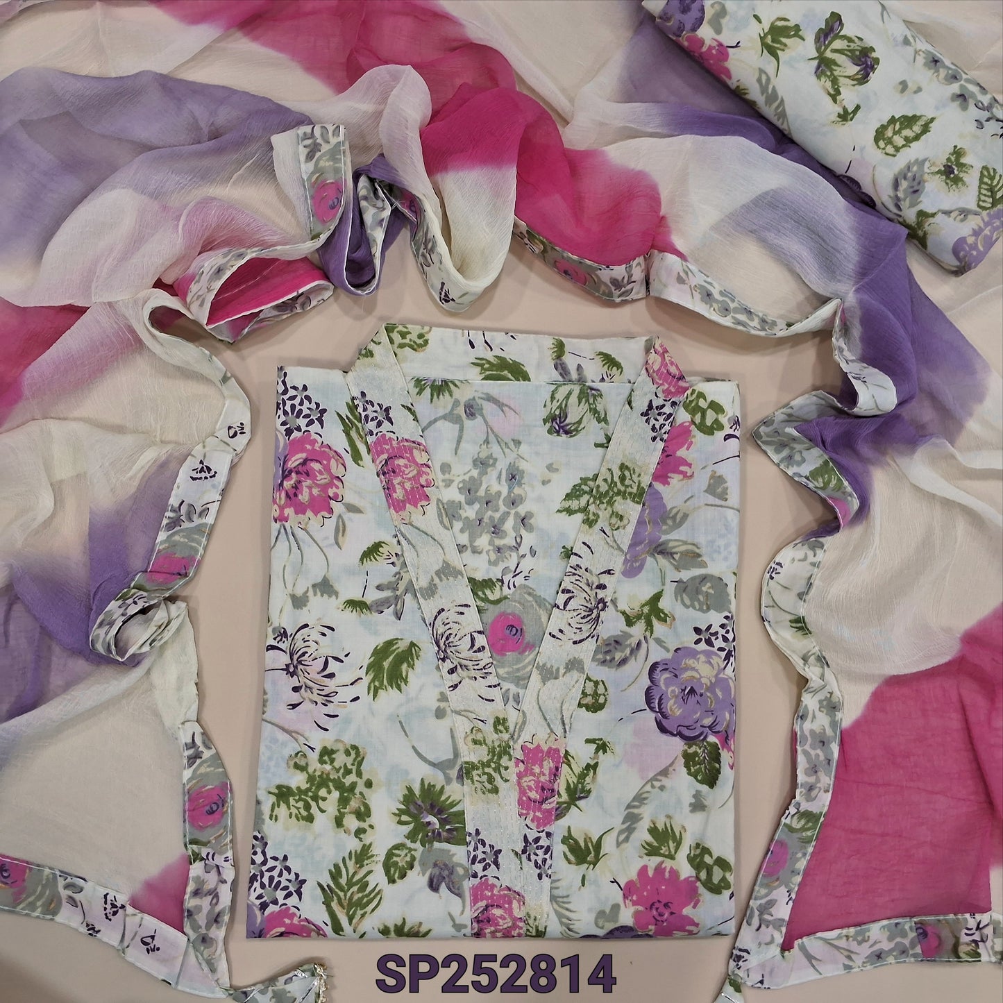 Half white floral printed pure cotton unstitched salwar material, V Neckline (Lining Needed) Matching printed bottom, multicolor fancy chiffon short width dupatta. SP252814