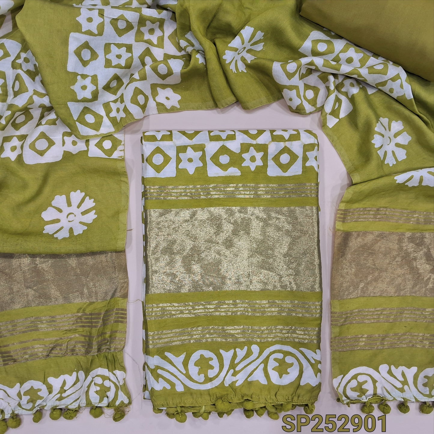Mehandi green original wax batik dyed fancy silk cotton unstitched salwar material, tapings and tissue on daman (Soft, Lining Needed) Matching spun cotton bottom, batik dyed soft silk cotton dupatta. SP252901