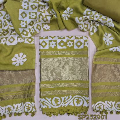 Mehandi green original wax batik dyed fancy silk cotton unstitched salwar material, tapings and tissue on daman (Soft, Lining Needed) Matching spun cotton bottom, batik dyed soft silk cotton dupatta. SP252901