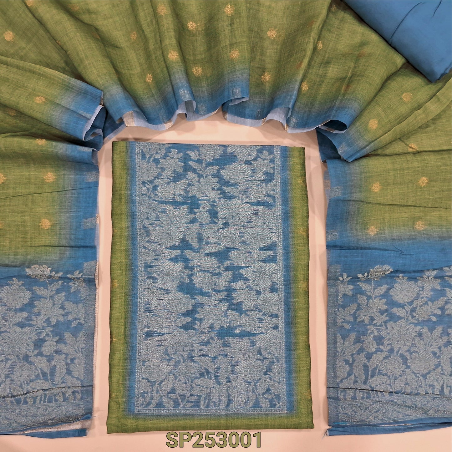 Mossy green premium silk cotton unstitched salwar material, banarasi antique gold zari woven yoke, small zari floral buttas on front (Thin, Lining Needed) Blue bottom, dupatta with zari buttas and rich pallu. SP253001