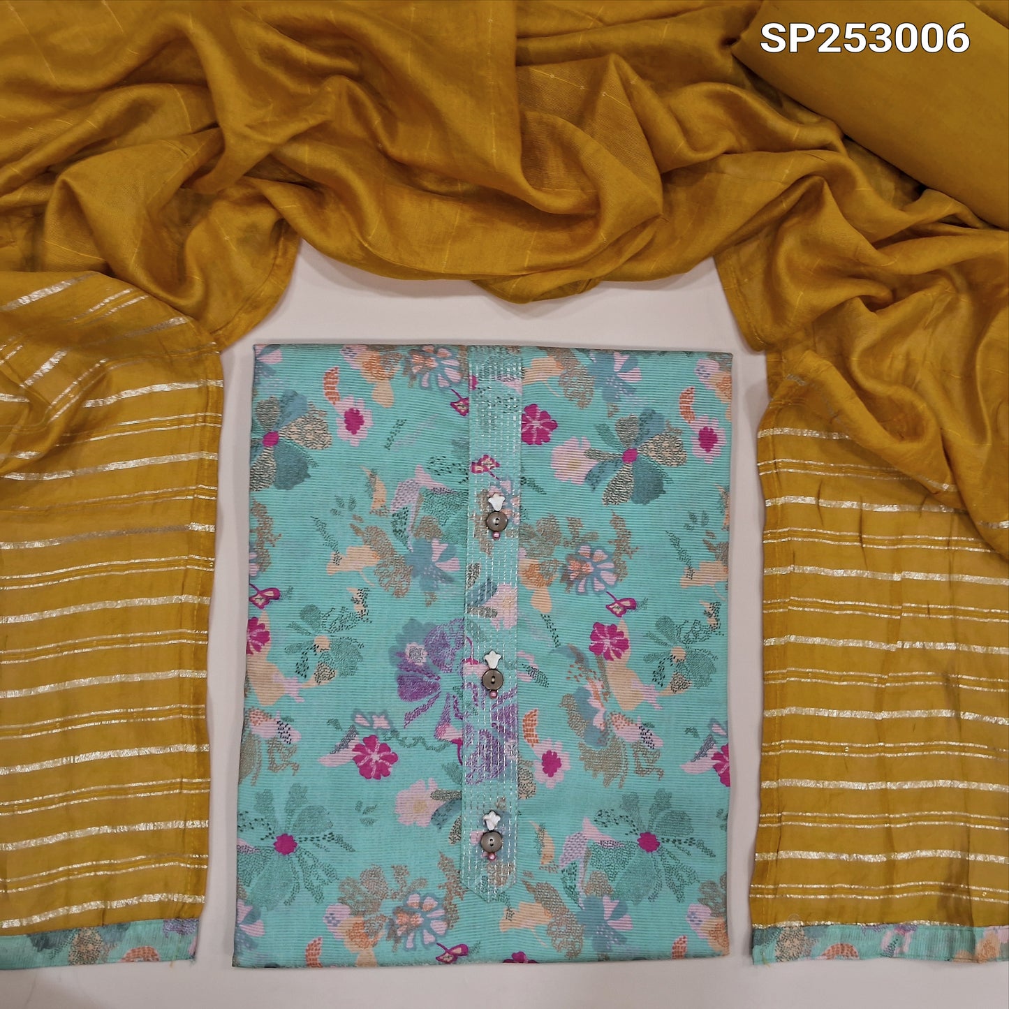 Pastel blue tissue silk cotton unstitched salwar material, printed, thin gold zari lines all over (lightweight, Thin, Lining Needed) Simple Yoke, Mehandi yellow cotton bottom, fancy silk cotton dupatta with sequins and zari lines. SP253007