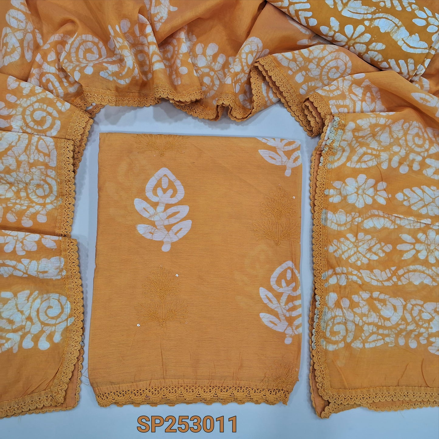 Mango Yellow Batik dyed fancy silk cotton unstitched salwar material, batik dye and embroidery work on front(lining needed) batik dyed santoon bottom and fancy silk cotton dupatta. SP253011