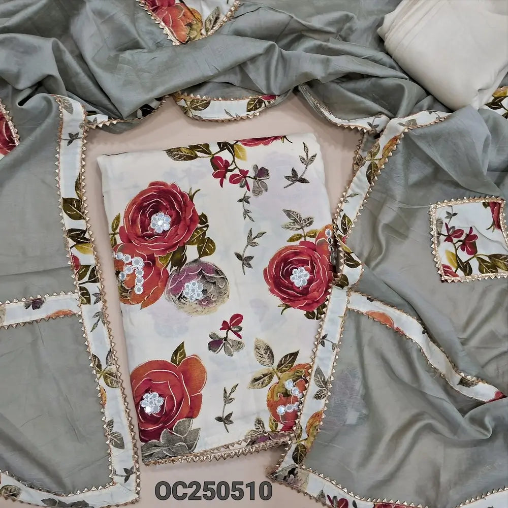 Half white modal masleen floral printed unstitched salwar material with foil mirror work on front, matching spun cotton bottom, fancy silk cotton dupatta with applique work and tapings. OC250511