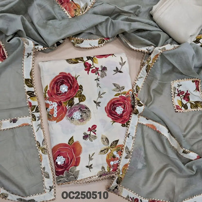 Half white modal masleen floral printed unstitched salwar material with foil mirror work on front, matching spun cotton bottom, fancy silk cotton dupatta with applique work and tapings. OC250511