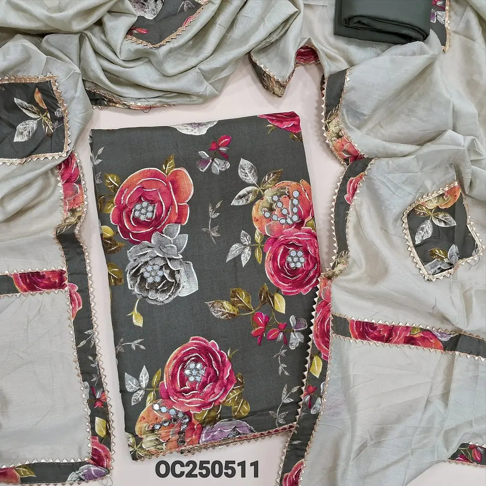 Grey modal masleen floral printed unstitched salwar material with foil mirror work on front, matching spun cotton bottom, fancy silk cotton dupatta with applique work and tapings. OC250511